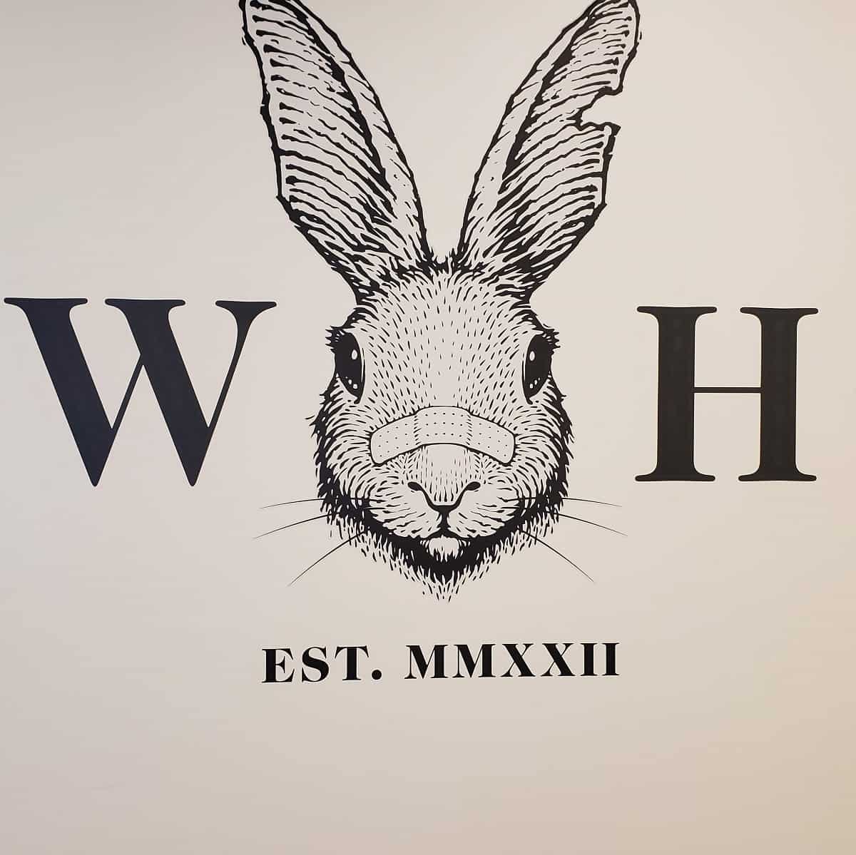 A photo of the Wild Hare restaurant logo.